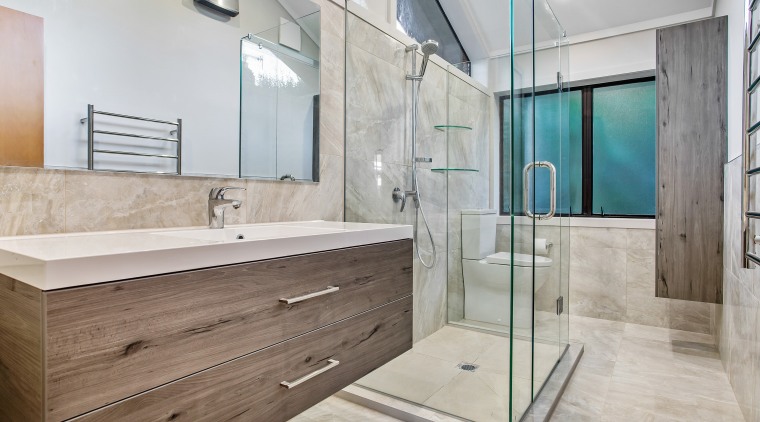 The EJ Building renovation places the shower in architecture, bathroom, bathroom accessory, bathtub, building, ceiling, estate, floor, flooring, furniture, glass, home, house, interior design, material property, plumbing fixture, property, real estate, room, tap, tile, wall, gray