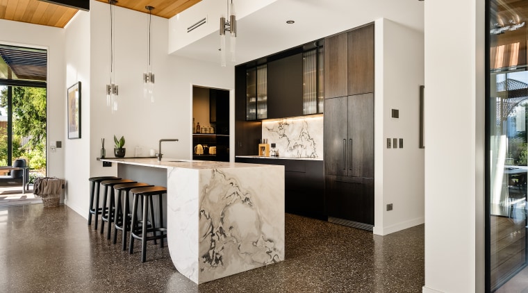 The kitchen is set back within the architecture 