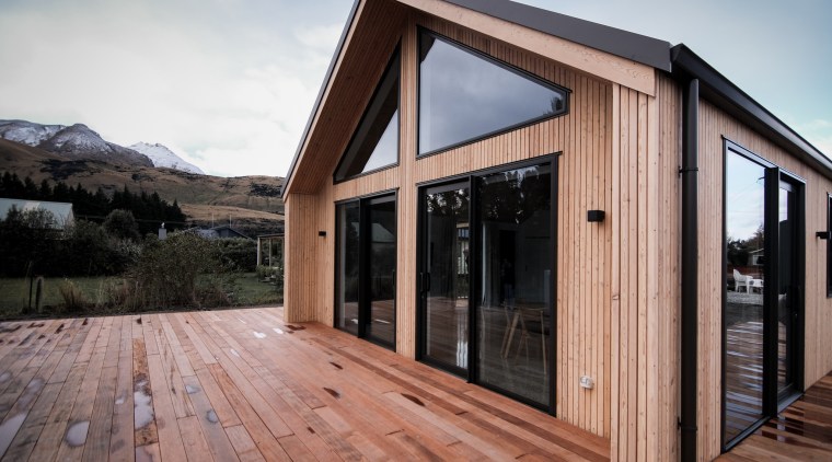 Exotic wood cladding and decking give this Fowler 