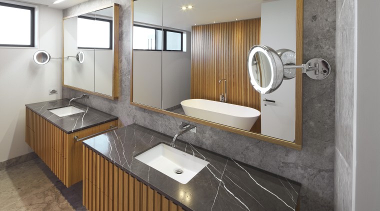 As well as vanity storage, there is additional cabinetry, countertop, interior design, kitchen, sink, gray