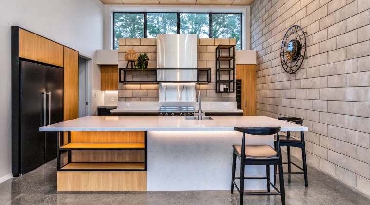 Cinderblock and character steel elements give this kitchen 