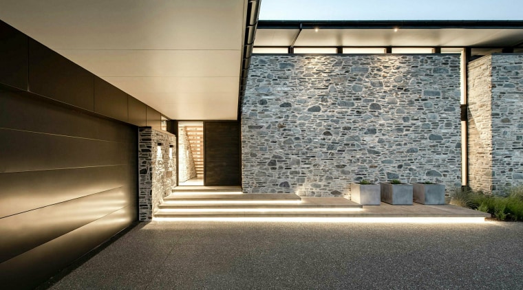 With a refined material palette of stone, timber, 