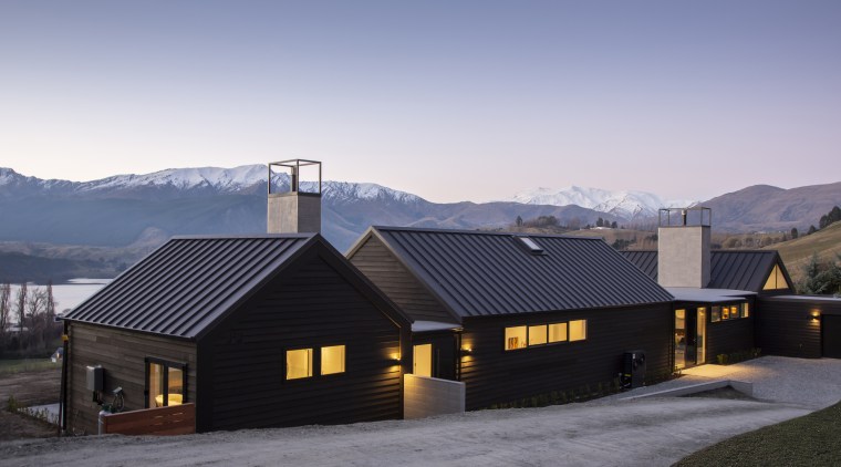 The home's gabled forms are like a mini 