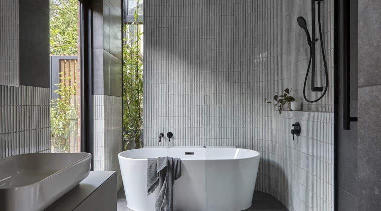 The ensuite is its own oasis, connected to 