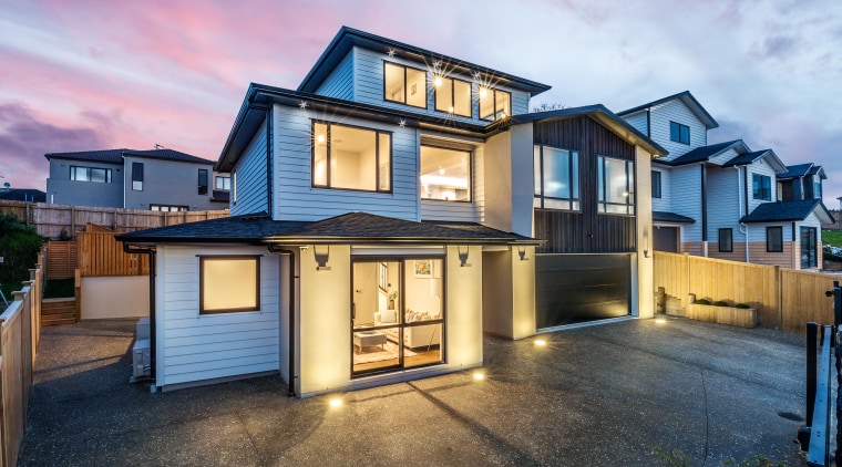 This high-end Albany showhome by Chancellor Construction is facade, home, house, property, real estate, residential area, siding, window, Sang Architectural Design, Elite North Harbour, Cove Lighting