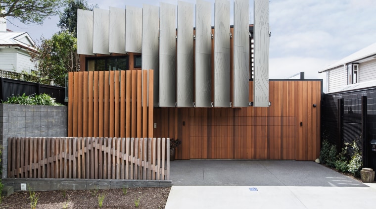 ​​​​​​​A fence depicting Mt Taranaki provides an excellent architecture, facade, house, home, Boon Team Architects, privacy