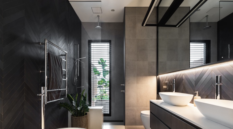 ​​​​​​​Concealed lighting under the wall cabinetry washes down architecture, bathroom, bathroom design, black, white, tiles,  vanity, Melonie Bayl-Smith, Andrew Lee, Bijl Architecture