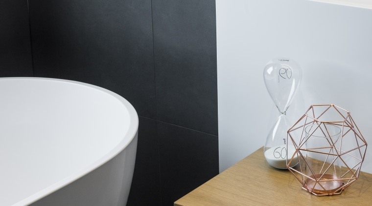 A curving engineered stone tub is juxtaposed with bathroom, bathroom sink, ceramic, floor, flooring, interior design, sink, tap, tile, Davinia Sutton