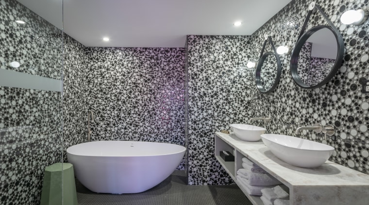 Japanese artist Yayoi Kusama’s dotted surfaces installations provided architecture, bathroom, ceramic, floor, flooring, interior design, property, purple, room, tile, wall, gray