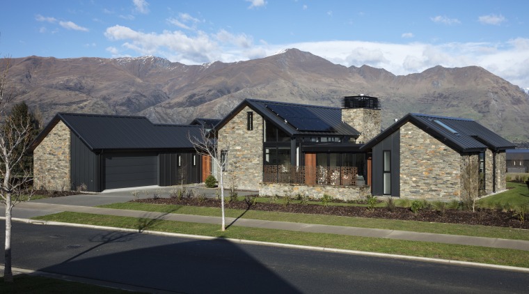 ​​​​​​​The far pavilion – the guest wing of architecture, home, house, landscape, mountain, ridge, roof, rural area, schist, stone, Condon Scott