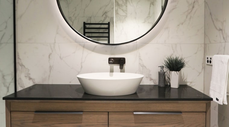 Elite supplied this wood vanity with custom edging architecture, bathroom, bathroom accessory, bathroom cabinet, floor, furniture, interior design, marble, material property, mirror, plumbing fixture, room, sink, table, tile, gray, white
