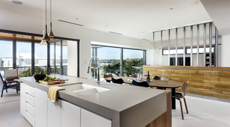 ​​​​​​​Kitchen with quite a view – this kitchen’s architecture, black-and-white, cabinetry, countertop, benchtop, design, floor, flooring, furniture, kitchen, lighting, gray, Ceasarstone, tap, Nadia Clark, Riverstone Custom Homes