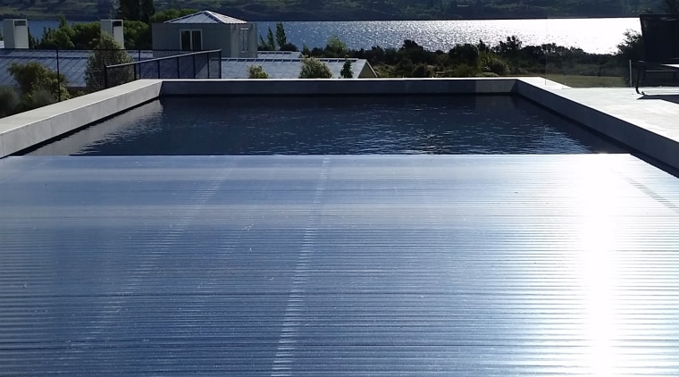 Covers 4 Pools has many automated options with architecture, daylighting, lake, line, mountain, reflection, roof, sky, sunlight, technology, blue, gray