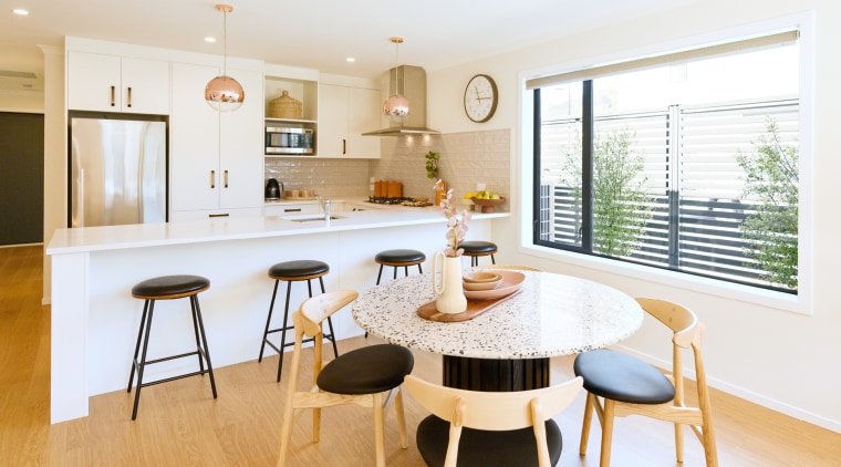 The kitchen/dining area is also bathed in natural 