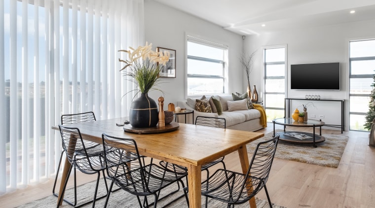 Vertical blinds provide control over the sun's rays. 