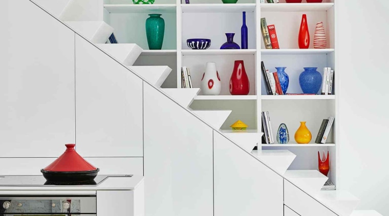 The cupboards under the stairs hold kitchen appliances furniture, interior design, product, shelf, shelving, white