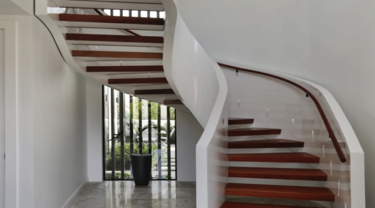 On this lux seafront home, the steel stair 