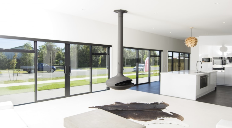 The expansive living, dining and kitchen zones make architecture, house, interior design, window, white, new home builder, GJ Gardner Homes, Living space