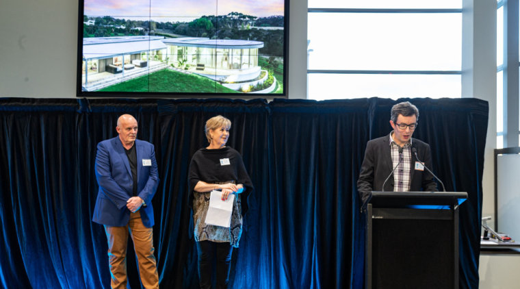 2019 TIDA New Zealand Homes presentation evening company, convention, display device, electronic device, event, job, media, product, speech, stage equipment, technology, black, blue