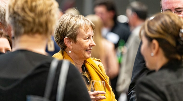 2019 TIDA New Zealand Homes presentation evening conversation, crowd, event, human, interaction, people, yellow, black