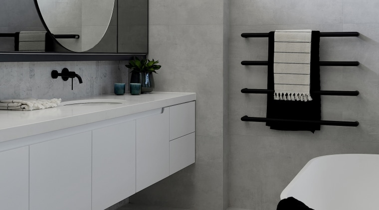 The master ensuite is cool and contemporary in 