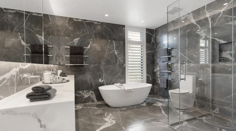 Specially sourced tiles in the main bathroom combine architecture, bathroom, bathtub, black, black-and-white, building, ceiling, floor, flooring, home, house, interior design, marble, material property, monochrome photography, plumbing fixture, property, real estate, room, tile, white, gray
