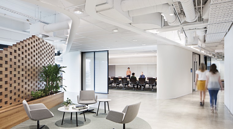 Beyond the central reception wall at ADCO Constructions’ architecture, ceiling, daylighting, interior design, lobby, office, gray
