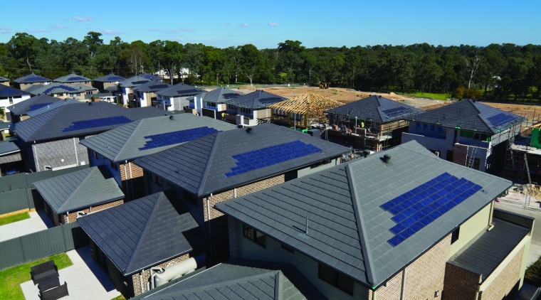 Monier Colour through concrete tiles - Cambridge featuring daylighting, energy, home, house, property, real estate, residential area, roof, sky, solar energy, suburb, blue