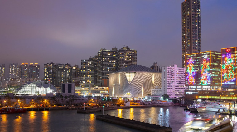 The theatre spaces will provide a contemporary home architecture, bridge, building, city, cityscape, condominium, downtown, evening, harbor, human settlement, landmark, lighting, metropolis, metropolitan area, mixed-use, night, reflection, river, sky, skyline, skyscraper, tourist attraction, tower, tower block, town, urban area, water, waterway, purple