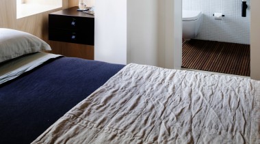 This reworked studio space by Architect Prineas vastly architecture, bed frame, bedroom, ceiling, floor, home, interior design, room, suite, wall, window, gray