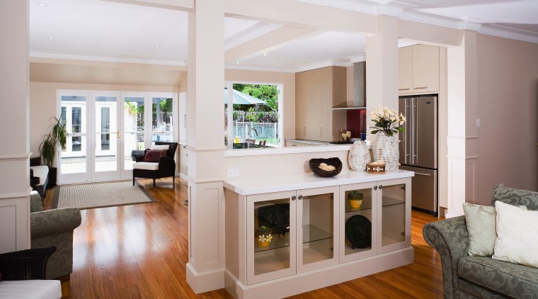 A view of the kitchen area, wooden flooring, floor, interior design, living room, real estate, room, window, gray