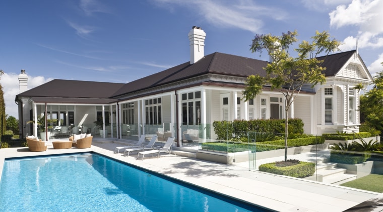 View of pool and garden designed by Humphreys cottage, elevation, estate, facade, home, house, mansion, property, real estate, residential area, swimming pool, villa, teal