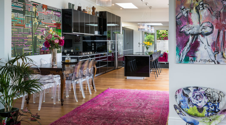 This kitchen by designer Damian Hannah provides a floor, home, interior design, living room, real estate, room, wall, gray