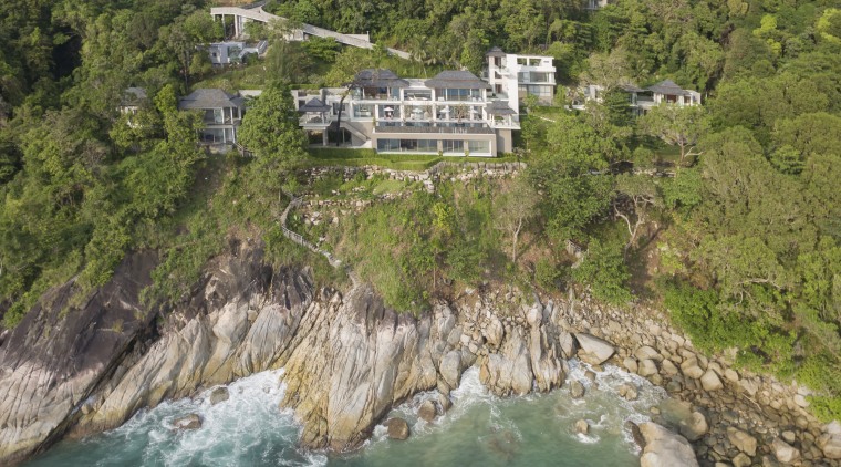 This extensive villa includes a clifftop frontage with bay, cliff, coast, coastal and oceanic landforms, cove, escarpment, geological phenomenon, hill station, nature reserve, promontory, real estate, terrain, water resources, brown