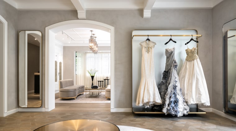 For the new House of Grace Chen base, boutique, bridal clothing, bride, ceiling, dress, floor, flooring, gown, home, interior design, lobby, room, wedding, wedding dress, gray