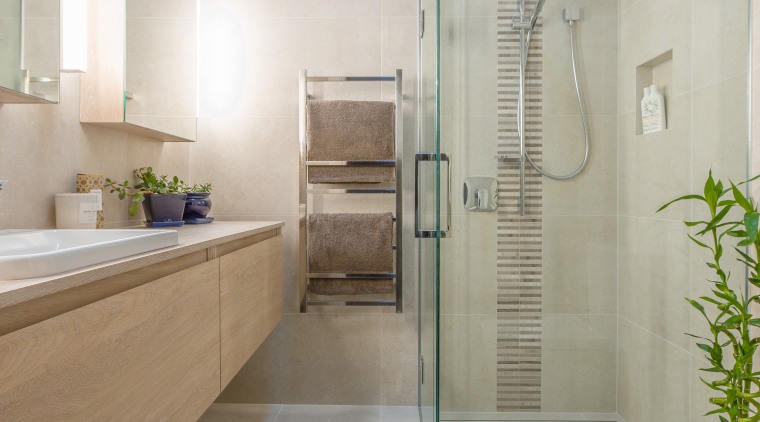 A high picture rail visually breaks up the architecture, bathroom, floor, home, interior design, room, tile, gray