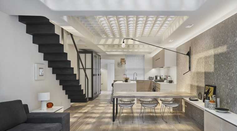 This renovation by Andy Martin Architecture has transformed ceiling, daylighting, floor, interior design, living room, loft, real estate, gray