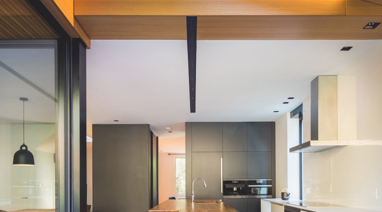An extension at the back of this 1930s architecture, ceiling, countertop, daylighting, house, interior design, kitchen, lighting, real estate, gray
