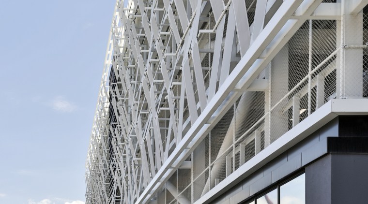 Interwoven taut bands of fabric ribbon by Structurflex architecture, building, metropolitan area, mixed use, structure, urban area, gray