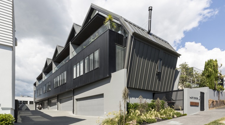 Leuschke Kahn Architects designed Scanlan Lofts to fully architecture, building, elevation, facade, home, house, real estate, white