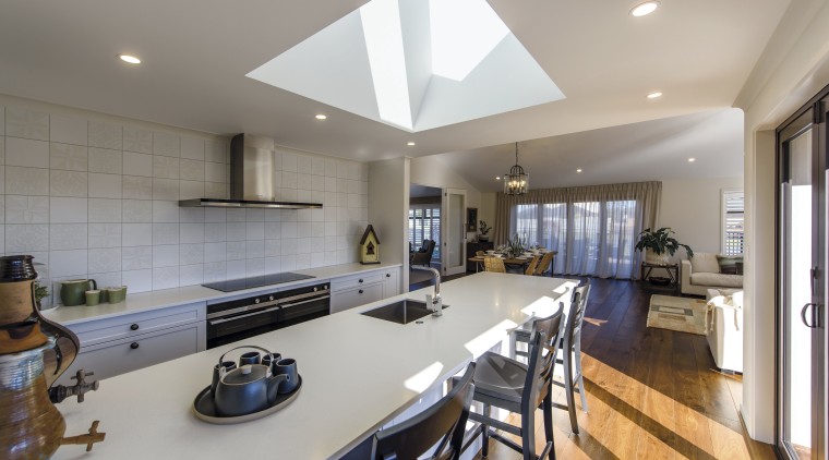 The kitchen in this Tauranga GJ Gardner showhome countertop, interior design, kitchen, real estate, room, gray