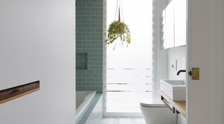 Breaking from convention, the tiles in this bathroom architecture, bathroom, ceiling, daylighting, floor, flooring, home, house, interior design, laminate flooring, room, tile, wall, window, wood flooring, gray