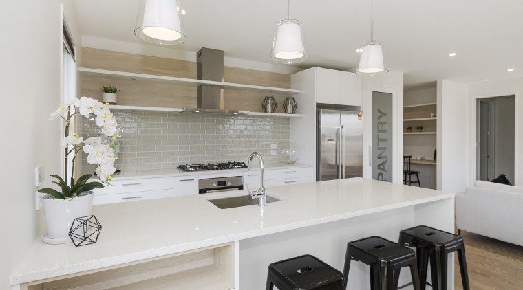 New family home features natural accents, expansive interiors, countertop, cuisine classique, home, interior design, kitchen, real estate, room, gray