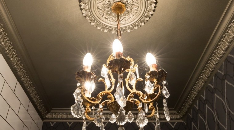 Chandelier and patterned wallpaper in powder room designed ceiling, chandelier, decor, light, light fixture, lighting, wall, black, brown