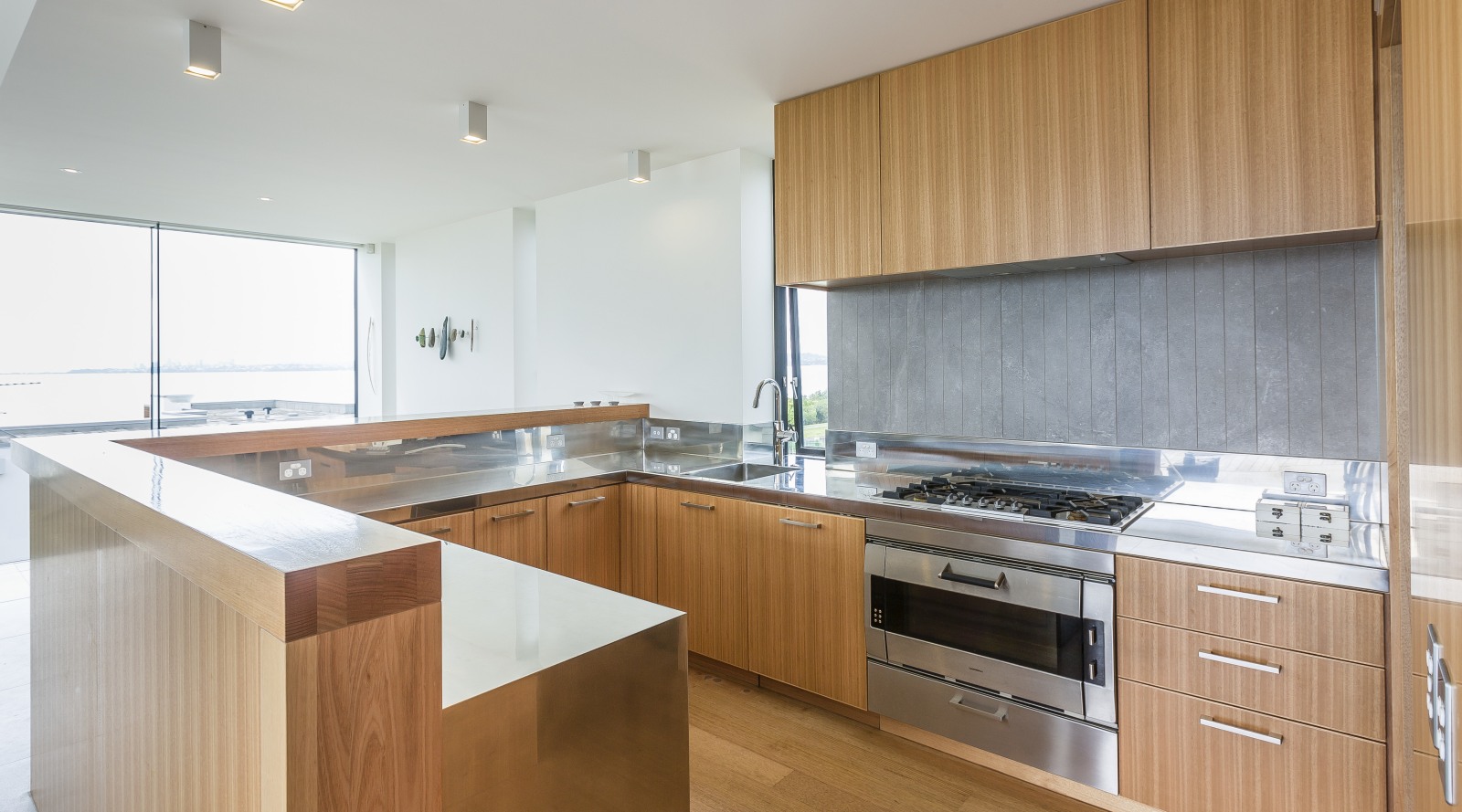 Sleek, modern kitchen with Tasmanian oak veneer… Trends