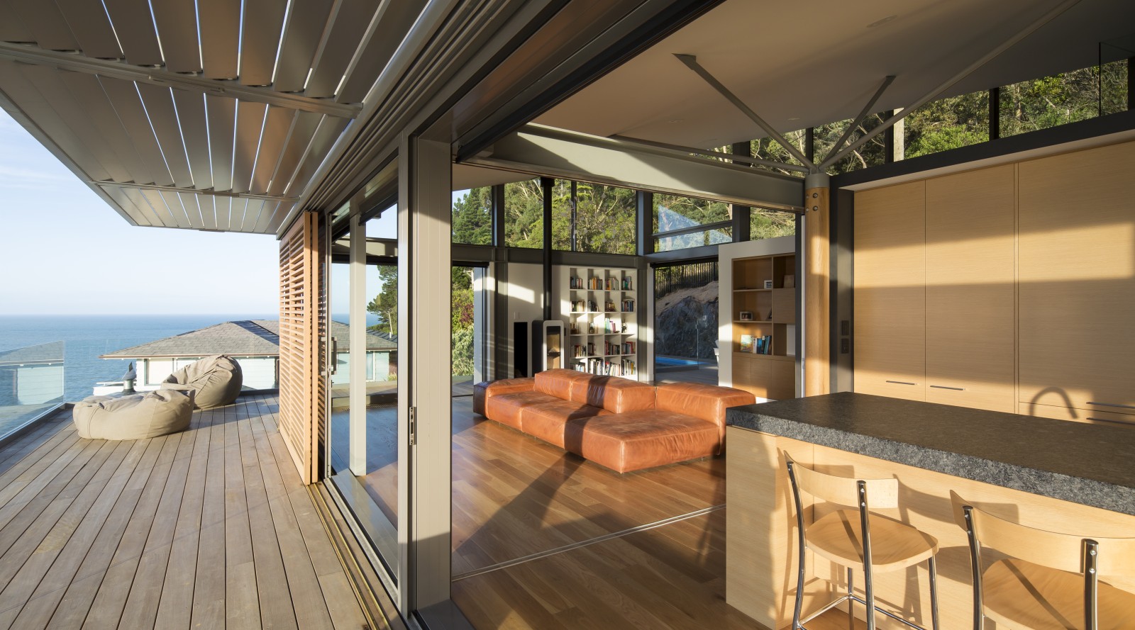 A sculpted steel roof gives this home control over… | Trends