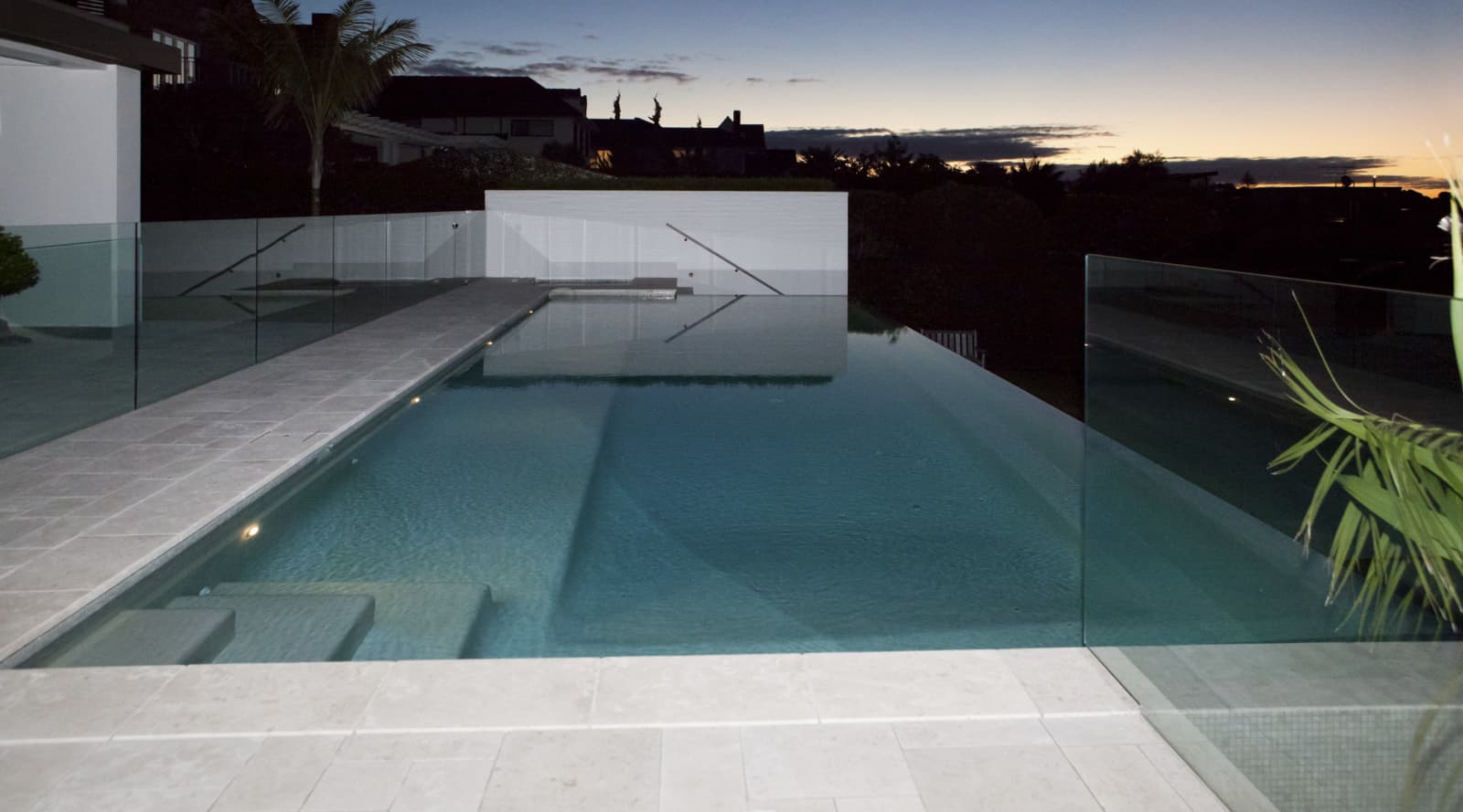 Calm waters new concrete pool by Tranquility Pools Trends