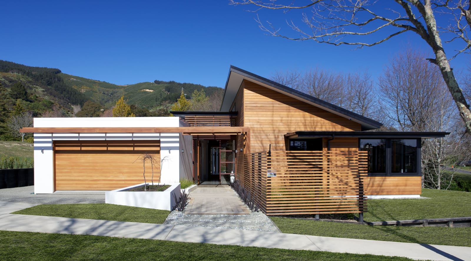 Show home with cedar timber, black and white… Trends