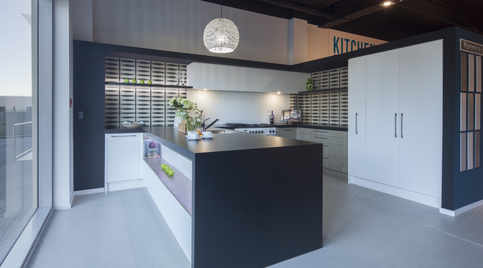 Modern black and white kitchen with grey-toned… | Trends