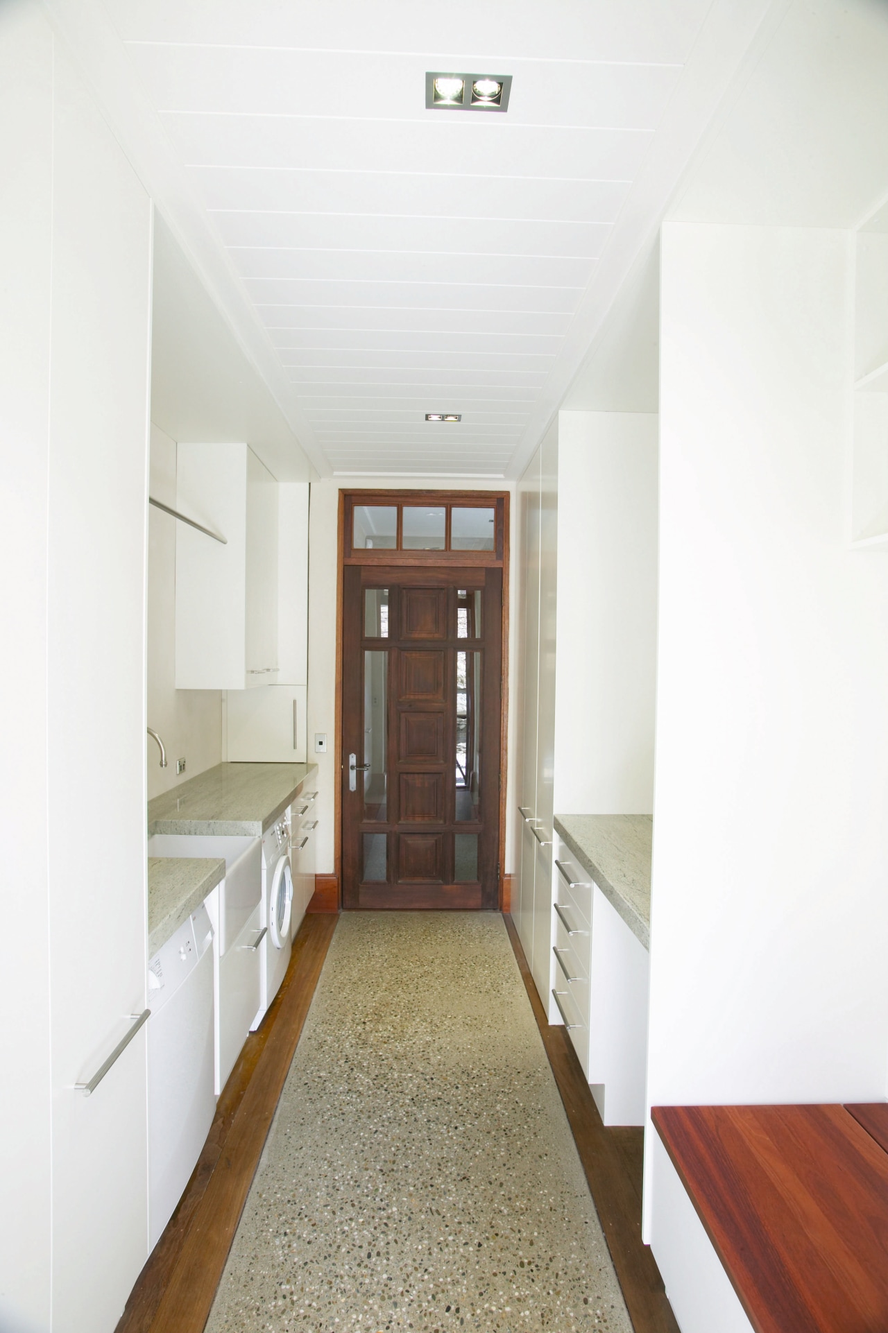 A view of a laundry architecture, ceiling, daylighting, floor, flooring, home, house, interior design, real estate, room, white